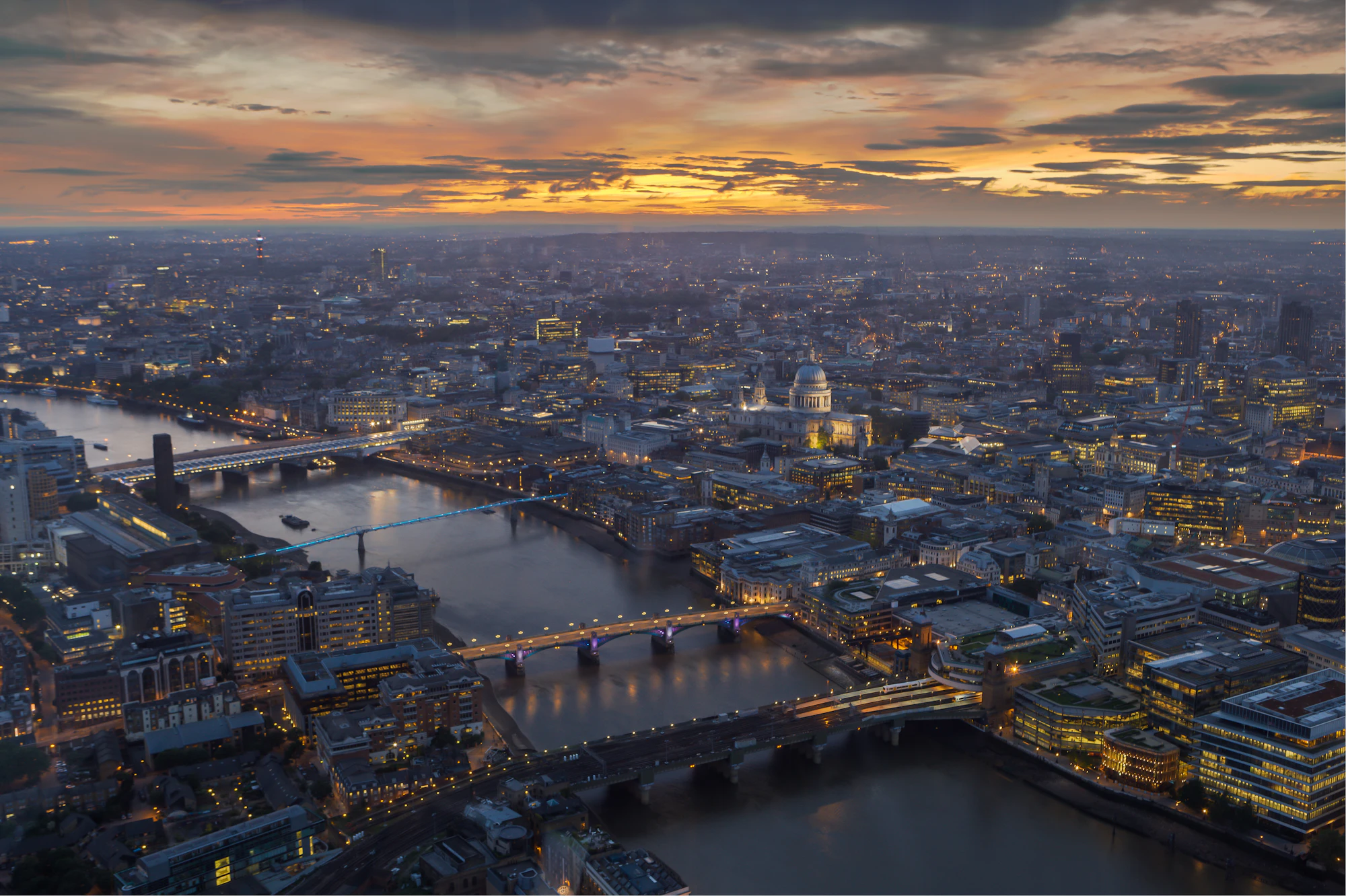Aerial view of London and the Thames at dusk